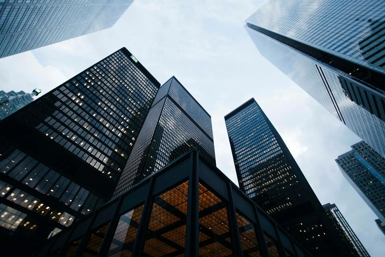 Reflective glass facade of the renewed Common Ground building